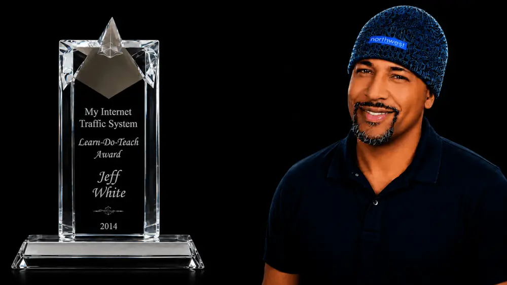 Jeff R. White pictured with his 2014 Learn-Do-Teach award